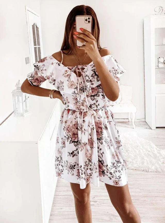 A stylish floral print dress with a flattering waist design, perfect for professional commuting