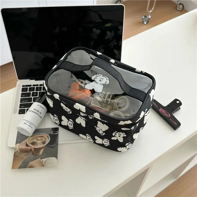 Cute dog-themed makeup bag with a playful design, made from durable cotton and PVC materials for practical and stylish organisation.