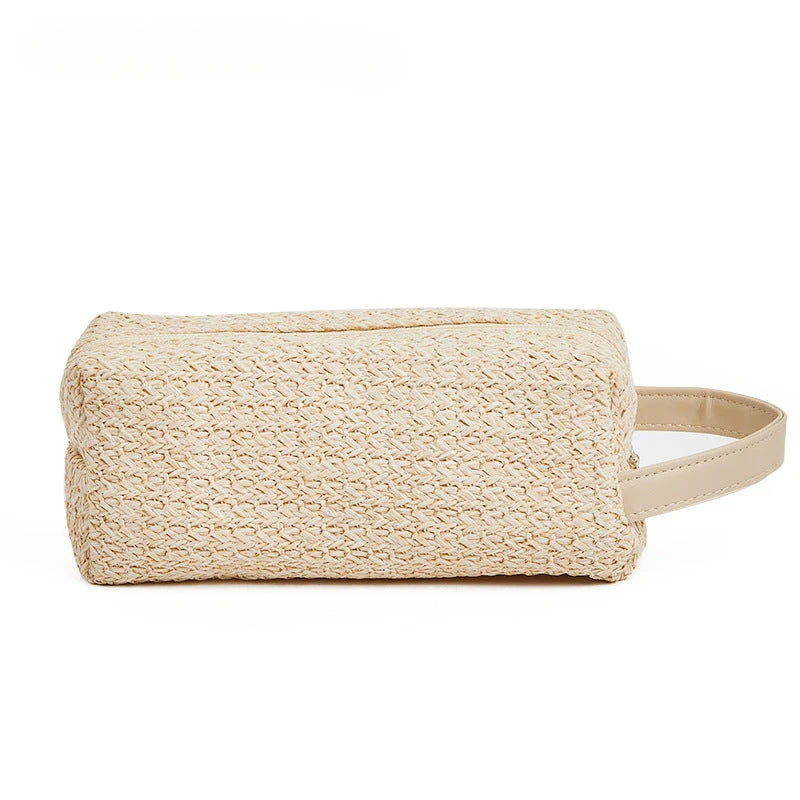 Elegant straw cosmetic bag with unique knitting pattern, ideal for organizing makeup and toiletries