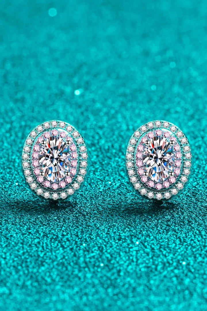 Elegant platinum-plated moissanite stud earrings with a minimalist design and sparkling stones