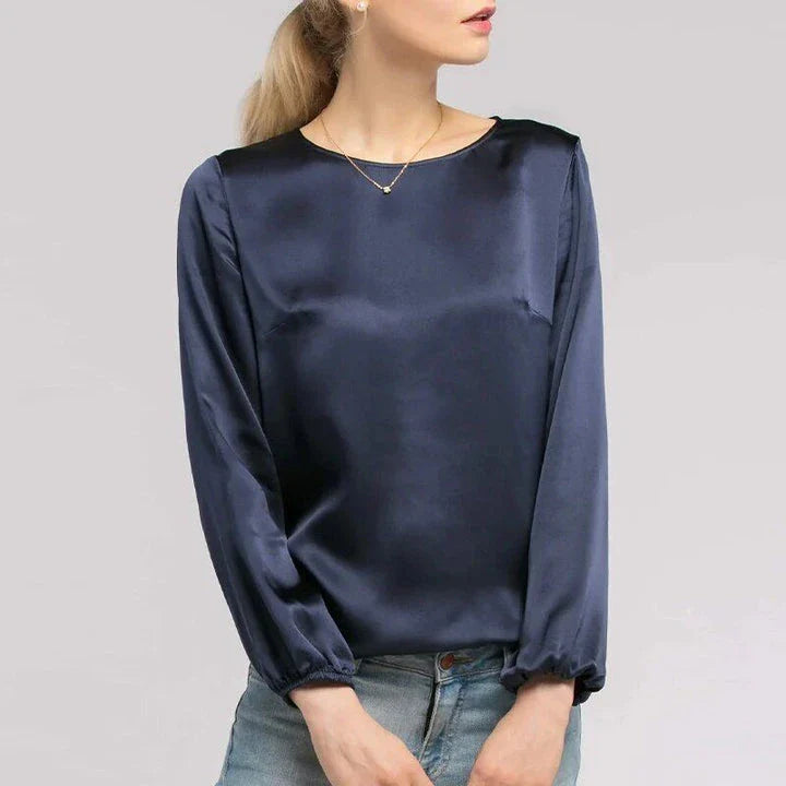 Elegant women's satin long sleeve blouse in dark blue colour with a relaxed yet refined silhouette