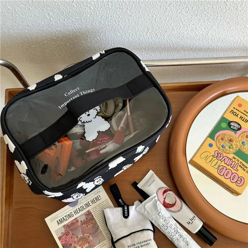 Cute dog-themed makeup bag with a playful design, made from durable cotton and PVC materials for practical and stylish organisation.