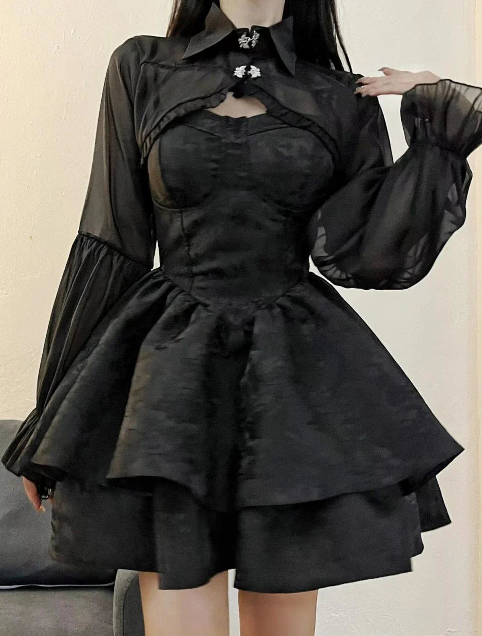 A stylish and elegant women's pettiskirt in a classic black colour, featuring a flowing A-line silhouette and premium polyester construction.