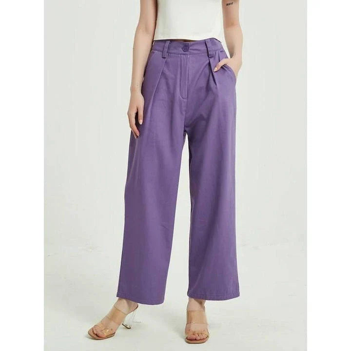 Elegant purple high-waisted wide-leg trousers with a vintage-inspired design, perfect for the modern British woman
