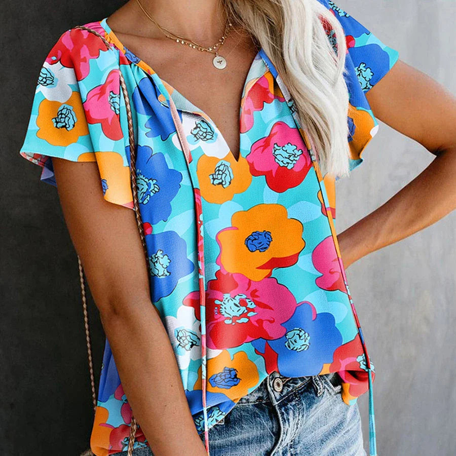 Elegant floral print drawstring v-neck short sleeve top in a pastoral, feminine style