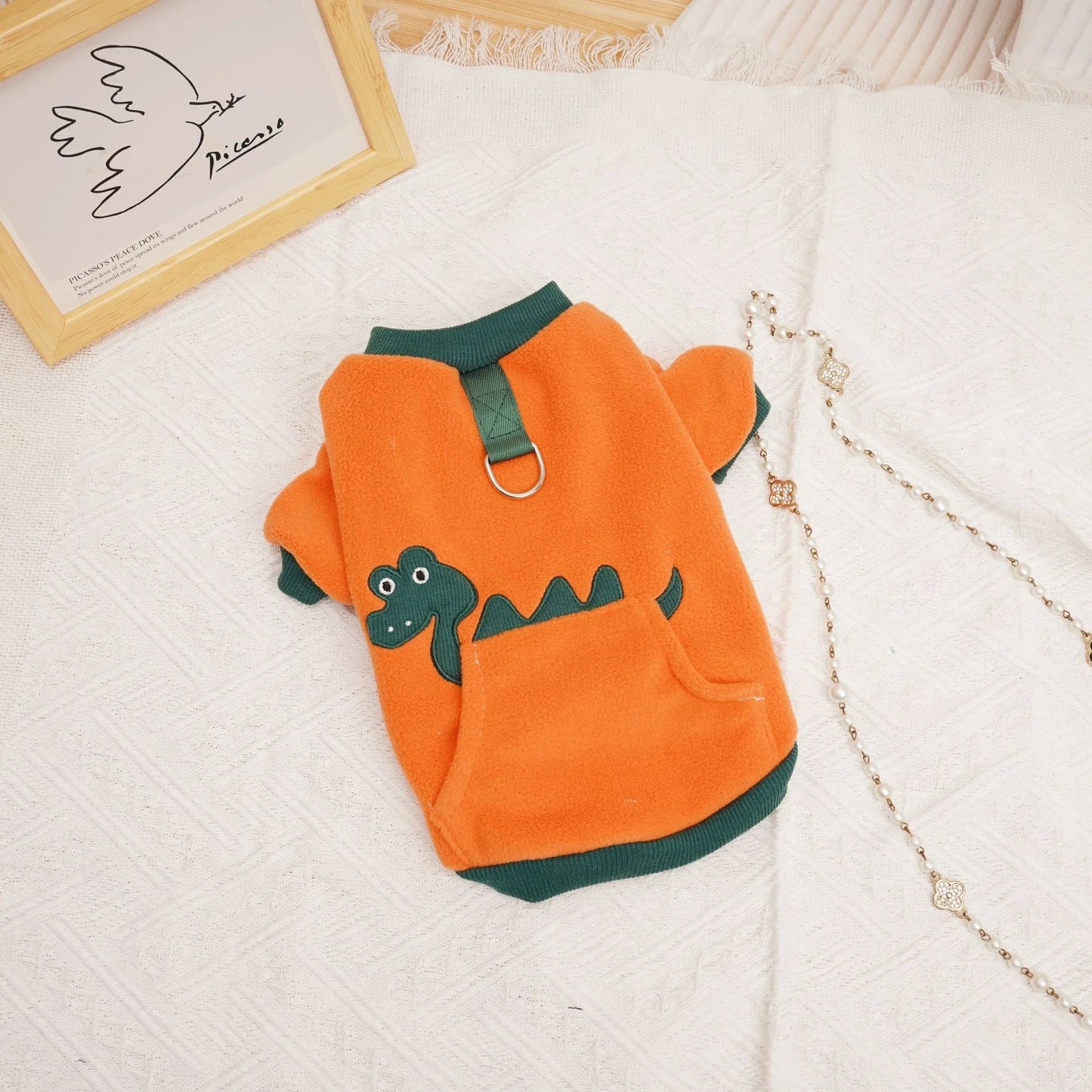 Plush and cosy pet clothing in various colours, designed for warmth and comfort