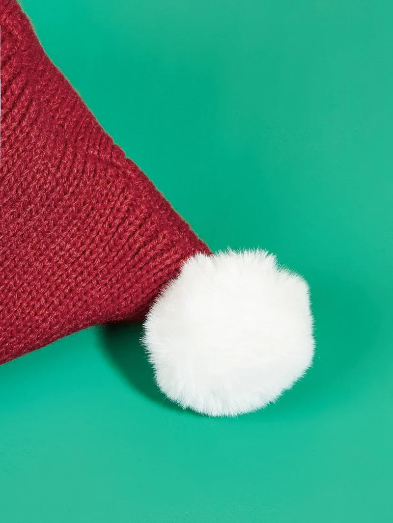 A cosy, knitted pet hat in a festive snowflake and reindeer design, available in various sizes to fit dogs and cats.