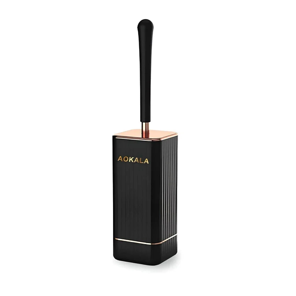 Elegant silicone toilet brush and holder set in black and white with rose gold accents, designed for modern bathroom cleaning