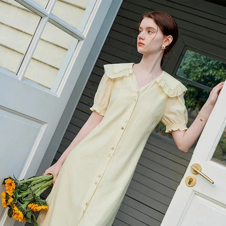 Elegant navy blue sailor collar dress with delicate fungus-edged sleeves, versatile and stylish for summer events