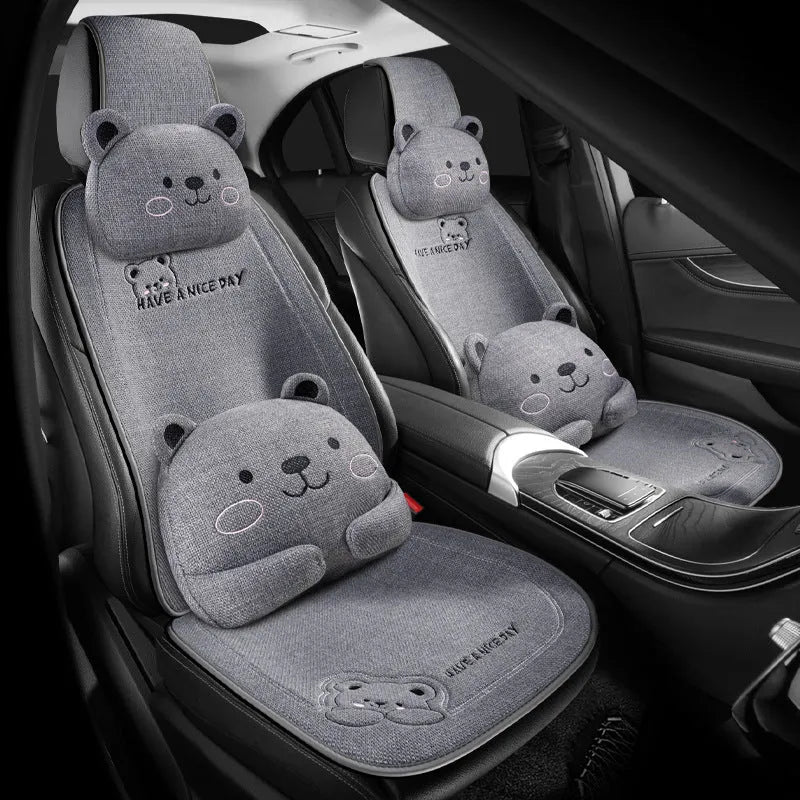 Car seat cushion set showing a linen cushion and separate lumbar support pillow in a choice of five colours.
