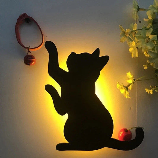 A stylish cat-themed LED lamp that automatically lights up when it detects sound, creating a cozy, ambient glow in a room.