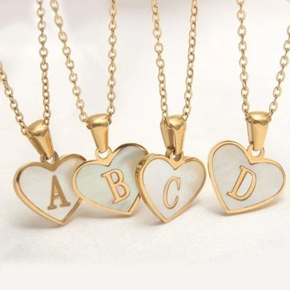 Personalized heart-shaped white shell necklace with adjustable clavicle chain, a stylish and versatile jewelry piece for women
