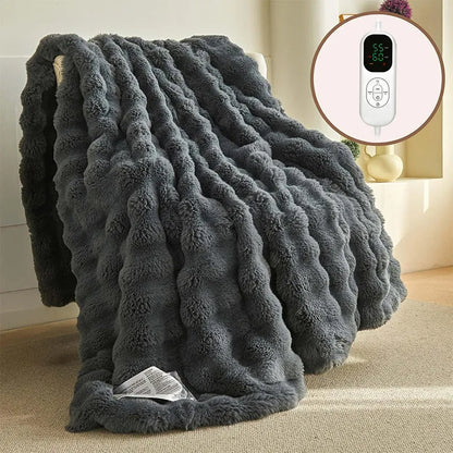 Dark grey far infrared electric heating blanket with carbon fibre elements on a double bed.