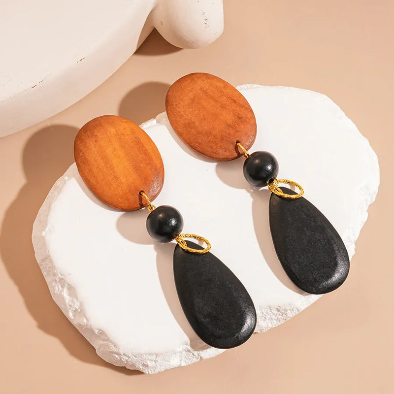 Earrings for women handmade from wood with retro fashion design featuring elliptical shape in silver needle-brown-black colour European American style personalised accessories