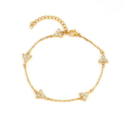 Women's stainless steel three diamond geometric triangular bracelet in gold finish with white zircon gemstones