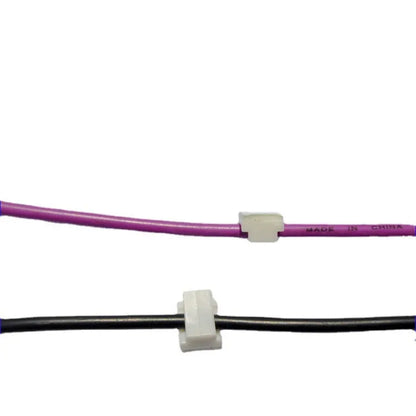 Black PA66 nylon car wire retaining clip for managing automotive and LED electronic cables.