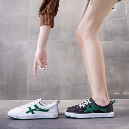 Cowhide leather casual sneakers with elastic band wearing in black or white colours, low top design with round toe