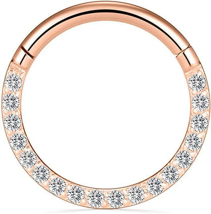 A seamless round hoop nose ring in stainless steel, shown alongside gold and rose gold colour options.