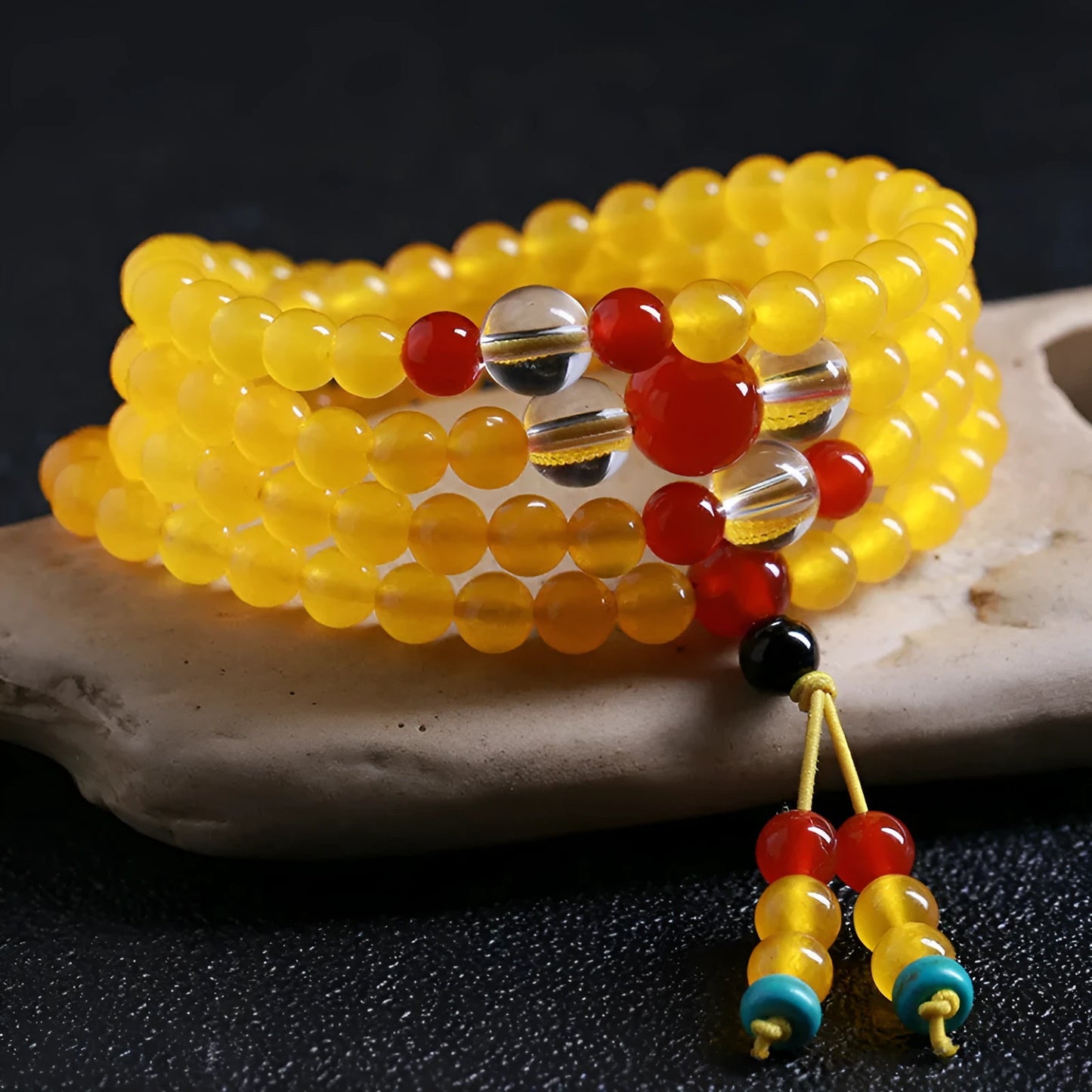 Crystal canary stone 108-bead necklace and bracelet set with geometric beads and lucky cat charm.
