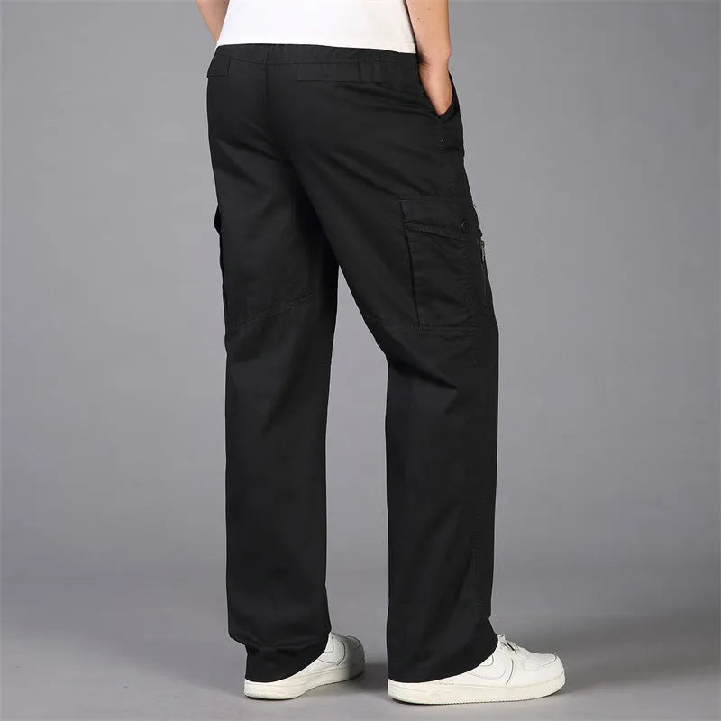 Loose straight leg cotton cargo trousers with multi-pocket, mid waist, zip placket, in black, army green, khaki, or natural yellow.