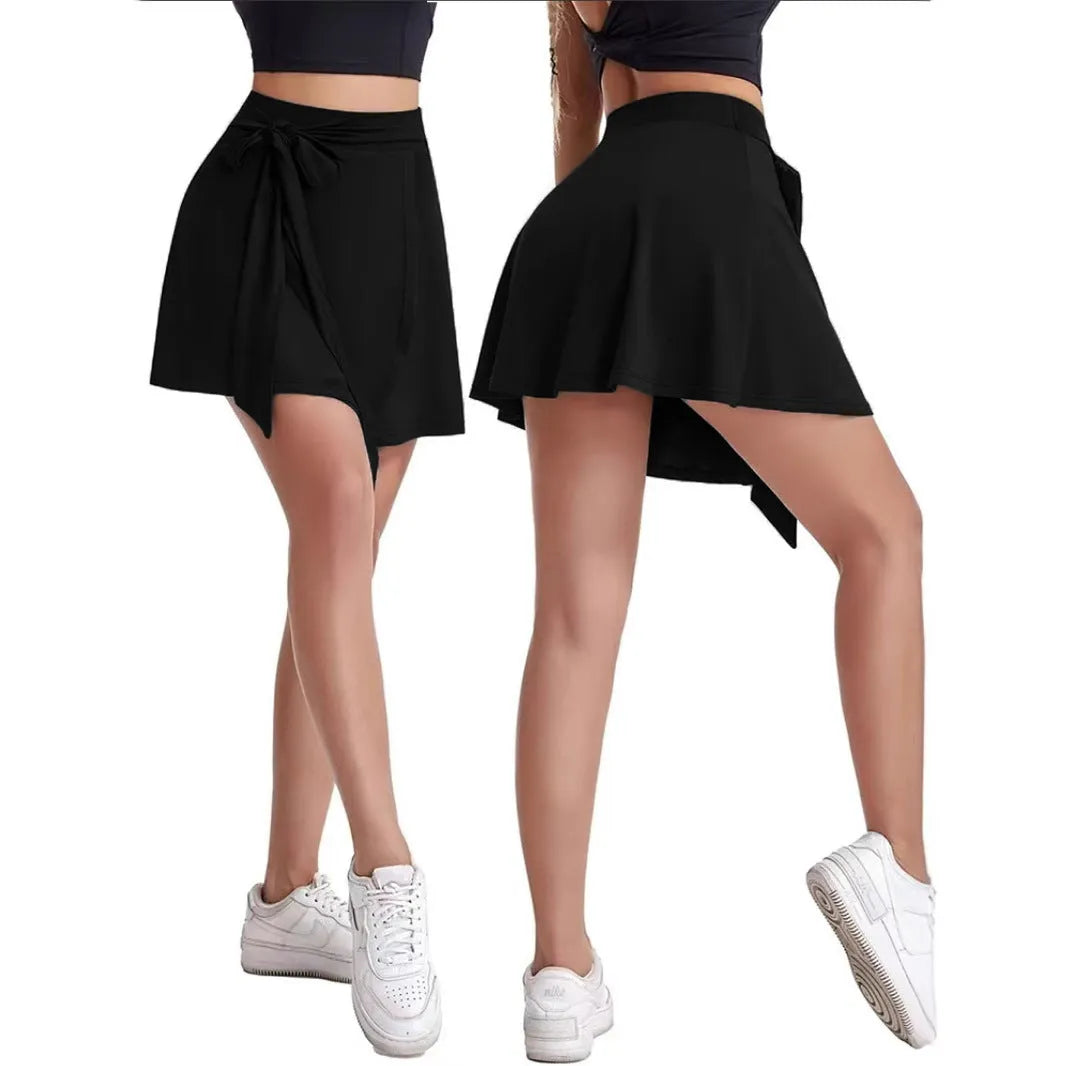 Black thigh-length unisex sports skirt with high waist and adjustable shoulder strap