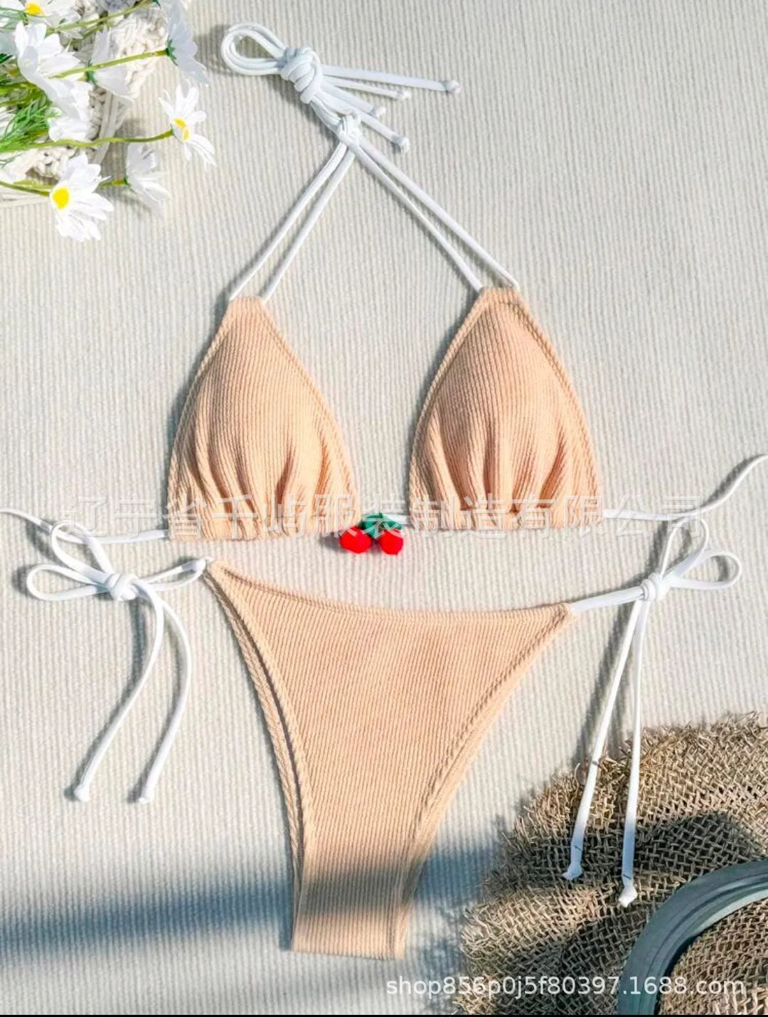 Women's sexy wind style bikini swimsuit in a solid colour, showing backless briefs design.