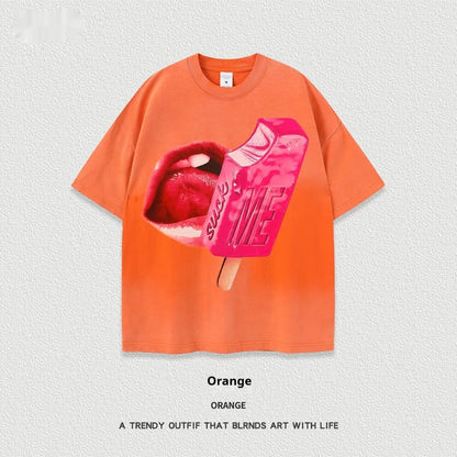 A loose-fit heavy washed cotton T-shirt with a cartoon print, shown in a selection of available colours.