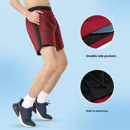 Men's solid-colour polyester basketball shorts with a low-rise waistband, shown in a selection of available colours.