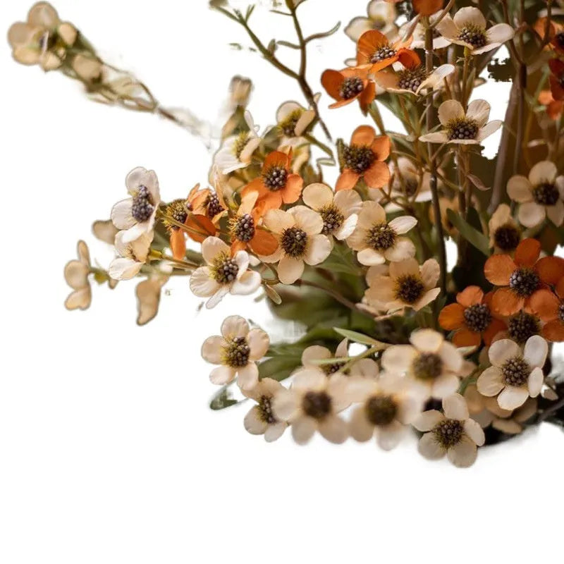 Bundle of four artificial dried flowers in orange, white, pink, and champagne colours for rustic decor