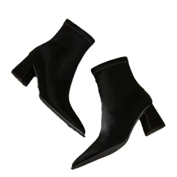 Women's khaki stretch suedette pointed toe ankle boots with a mid block heel on a white background.