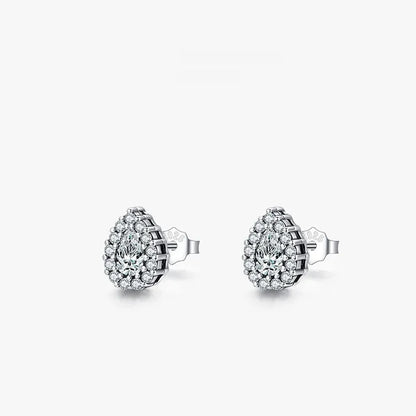 A pair of drop-shaped sterling silver ear studs with a diamond-cut finish.
