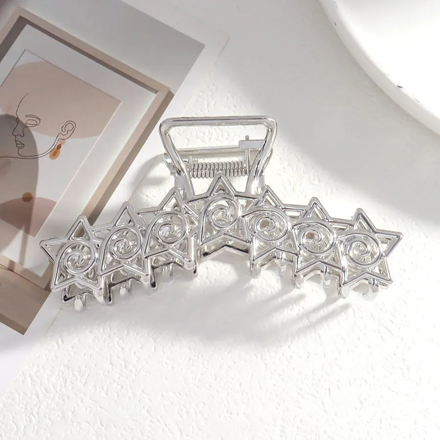 Silver metal hair claw barrette example from a range of 44 Korean-style designs.
