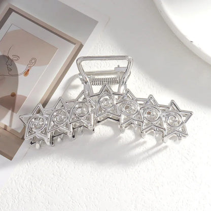 Silver metal hair claw barrette example from a range of 44 Korean-style designs.