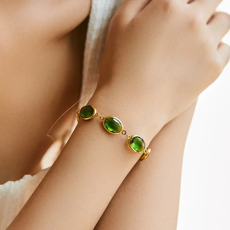 Geometric ellipse bracelet with glass inlay on 18K copper in blue, green, multicolor