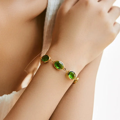 Geometric ellipse bracelet with glass inlay on 18K copper in blue, green, multicolor