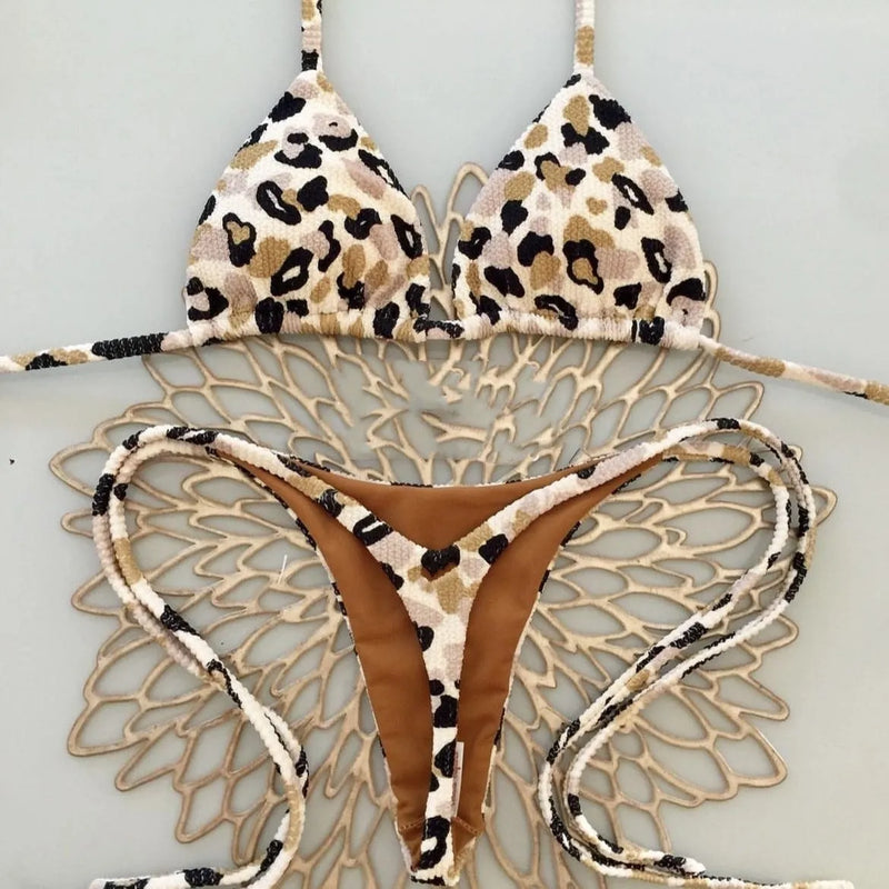 Women's swimwear bikini two-piece swimsuit with printed quick-dry fabric, high elasticity, and cotton lining, available in sizes S, M, L and colours RT1884, RT2110, RT2111 for swimming, wading, and beach activities.