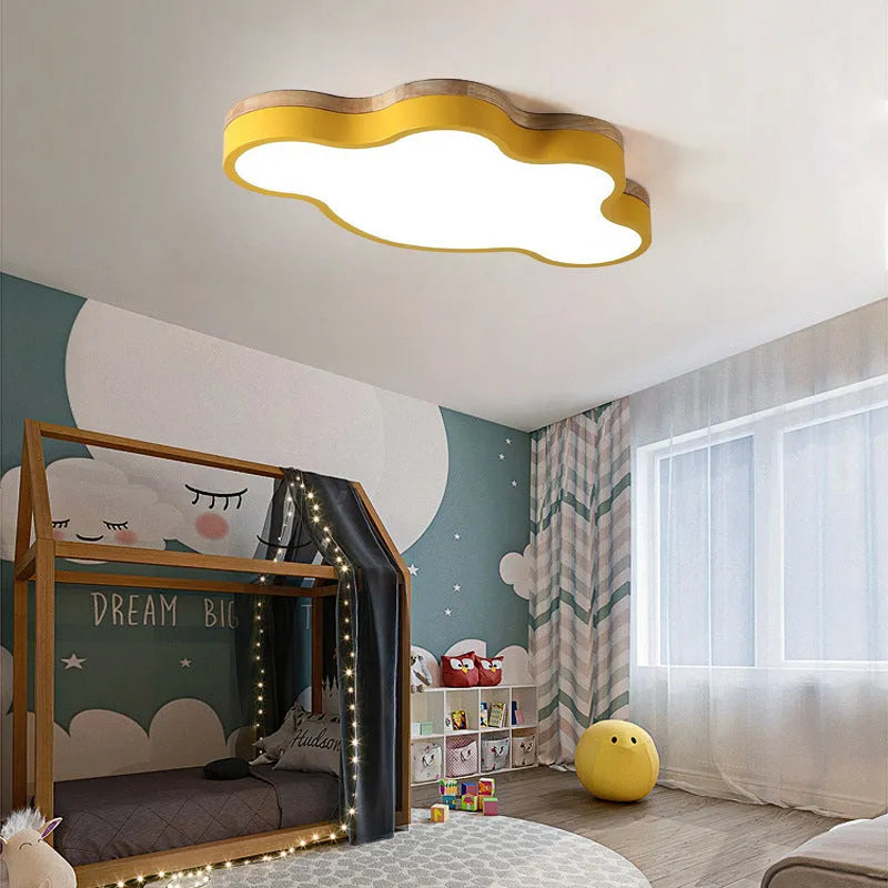 Cloud-shaped ceiling lamp with wooden construction and LED lighting in pink, blue, green, or yellow colour options