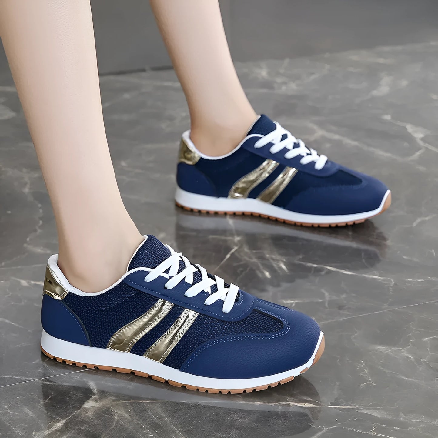 Blue women's casual sports shoes with cross shoulder straps and a round toe, featuring a flat heel and lace-up front.