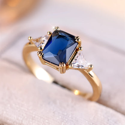 Rectangular women's fashion ring in gold sapphire blue copper with geometric design