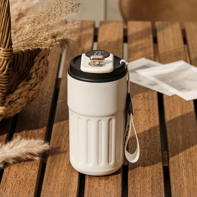 Digital thermal insulated bottle with temperature display and handle, stainless steel construction, 450ml capacity