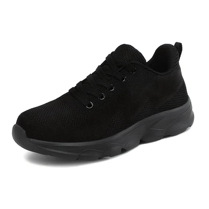 Women's black mesh running shoes with cross-strap and 3-5cm wedge heel, fabric upper with sewing details
