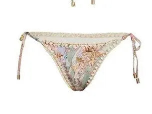 Women's creamy-white floral bikini suit with detachable skirt for beach and water sports