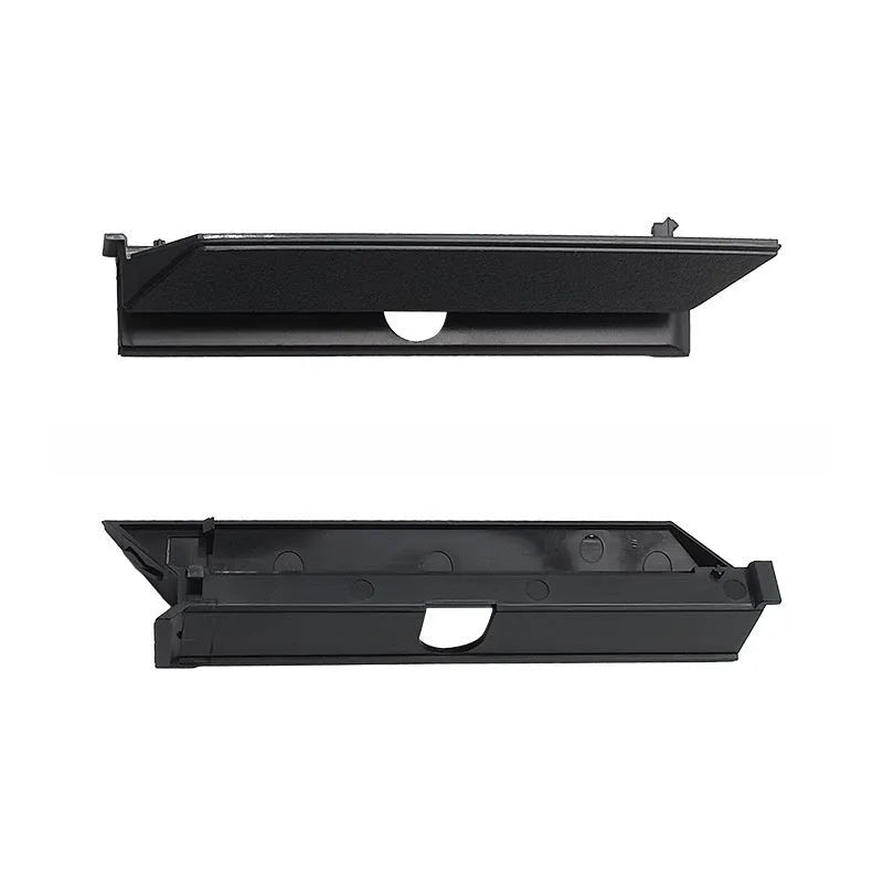 Black PS4 Pro hard drive bottom cover replacement part, showing clip details and ABS plastic construction.