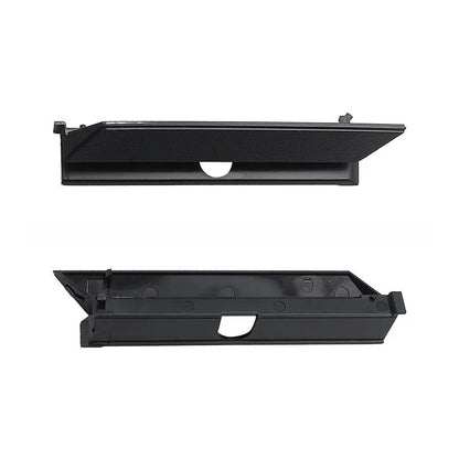 Black PS4 Pro hard drive bottom cover replacement part, showing clip details and ABS plastic construction.