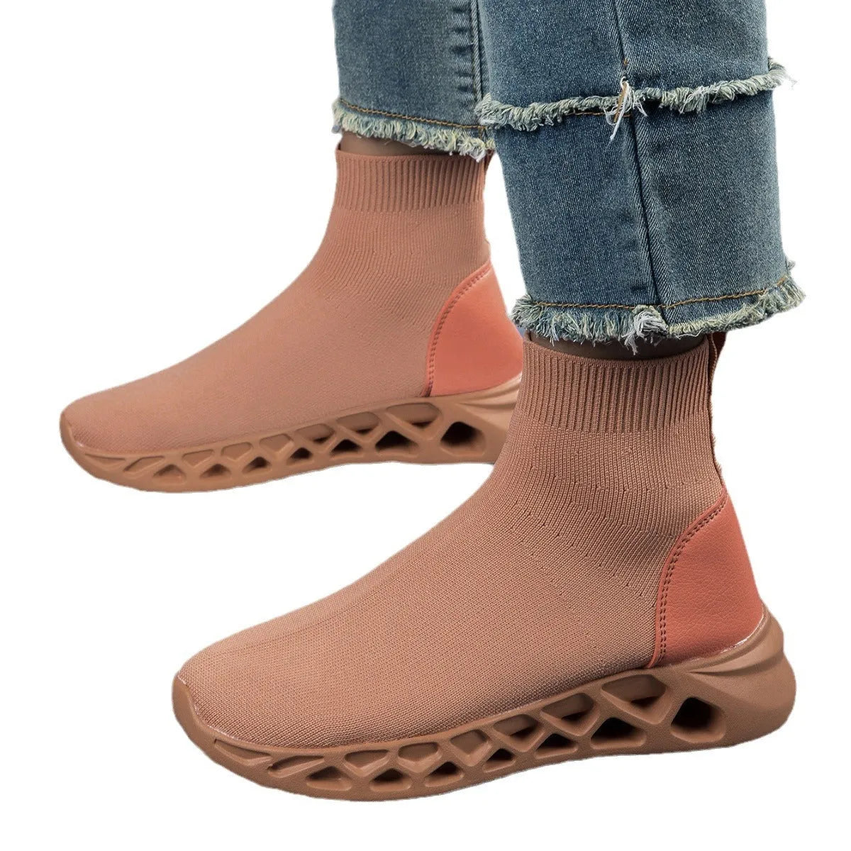 Women's casual mesh slip-on shoes in terracotta colour with flat sole and sewing line detail.
