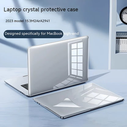 MacBook protective case in crystal transparent and frosted black finishes on a laptop.