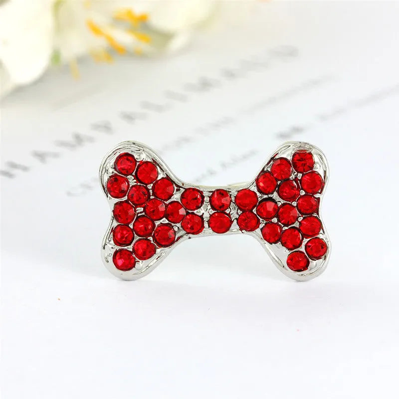 Rhinestone decorated dog bone shaped hair clip in alloy metal