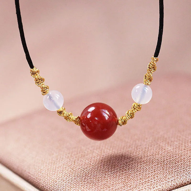 Hand-woven red agate bracelet and necklace set for women in national style with bead design.