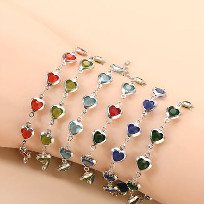 Devil's eye geometric heart bracelet in stainless steel showing colourful electroplated finish options.