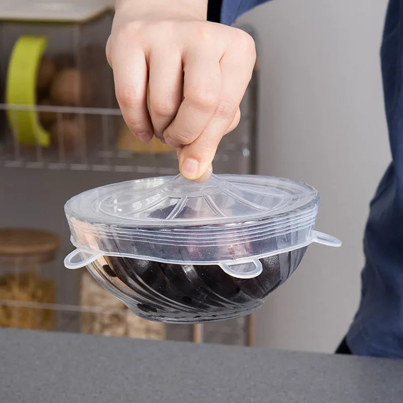 Six silicone stretch lids in graduated sizes from 6.5cm to 20.5cm diameter for covering bowls and jars